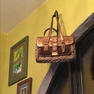 NEVER BEEN USED authentic gold coach bag